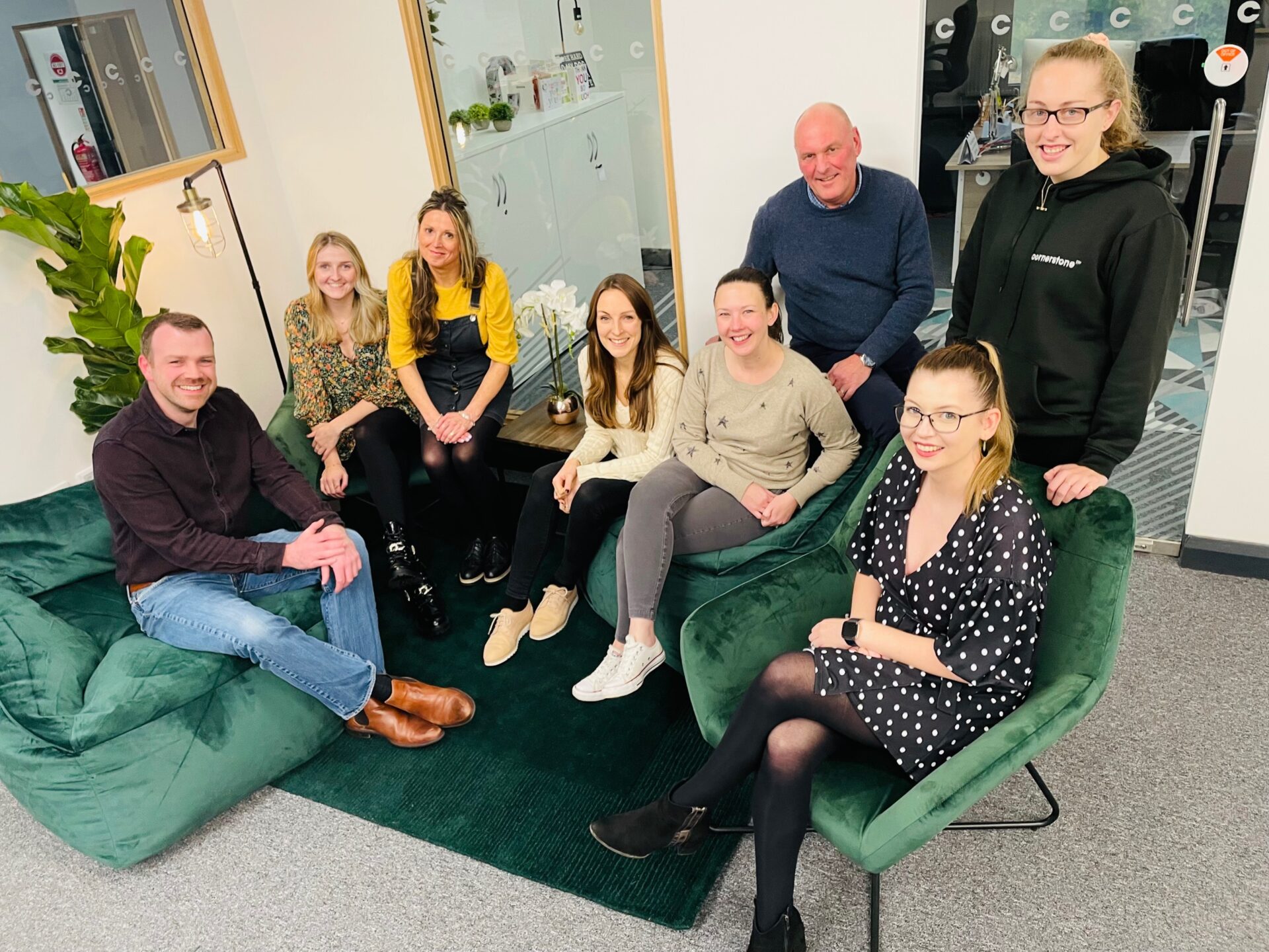 team photo in cosy corner